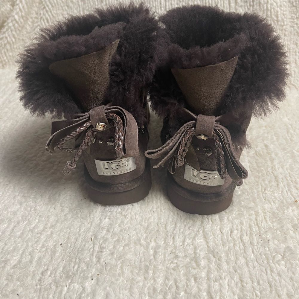 UGG Chocolate Shearling Boots with crystal and studs and bow accents SZ7